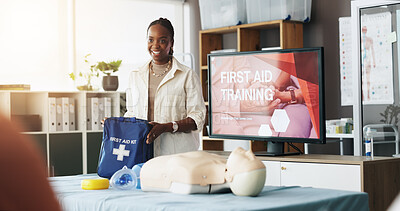 Buy stock photo Black woman, teaching and bag for first aid course of rescue safety, demonstration lesson and advice. Person, explain and medical kit for emergency risk, learning procedure and process of life saving