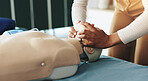 Hands, person and dummy for first aid course with demonstration, breathing safety and rescue. Instructor, explain and position mannequin for choking procedure, emergency process and urgency technique