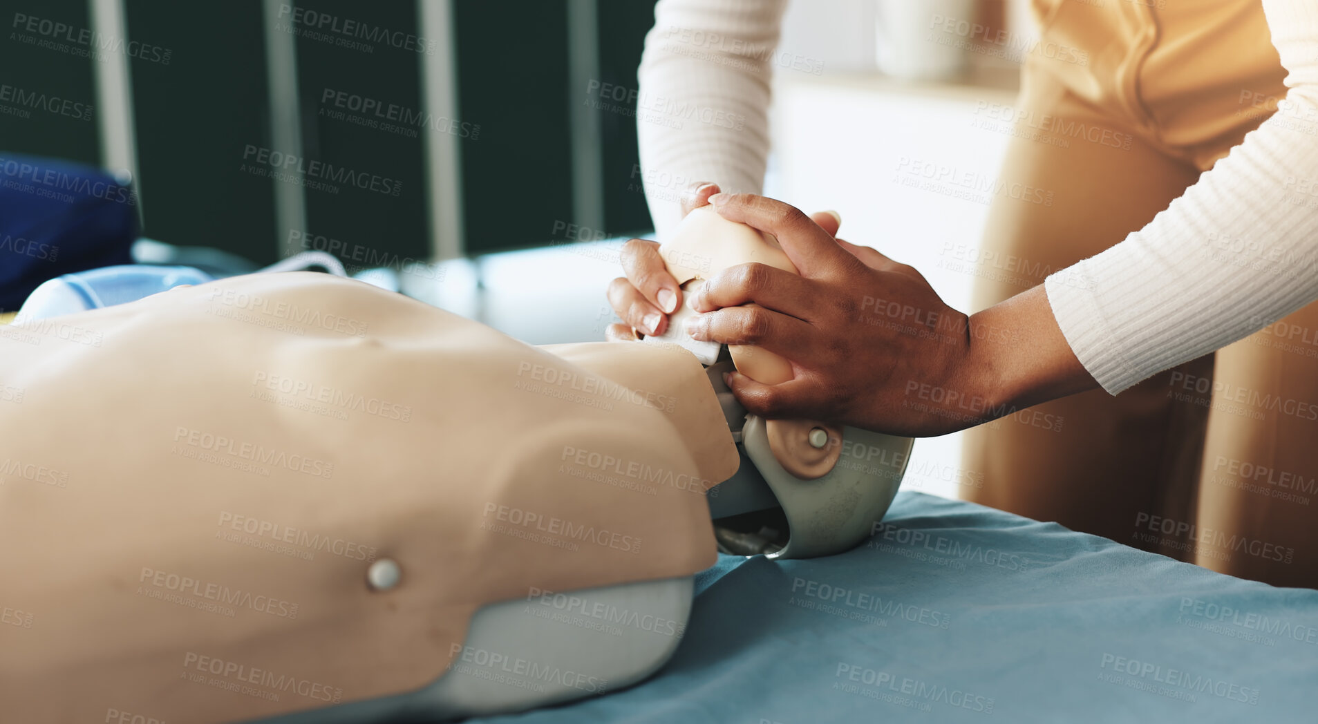 Buy stock photo Hands, person and dummy for first aid course with demonstration, breathing safety and rescue. Instructor, explain and position mannequin for choking procedure, emergency process and urgency technique