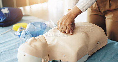 Buy stock photo Hands, person and dummy for cpr training with demonstration, compression and breathing safety. Woman, mannequin and ventilation process for medical emergency, healthcare protocol and cardiac arrest