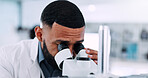 Man, forensic and scientist with microscope for exam, clinic trial or test results at laboratory. Male person, science or discovery with microscopic technology for DNA analysis or medical research