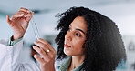 Woman, chemical and scientist with test tube in laboratory for liquid experiment, research or project. Pharmaceutical, science and female biologist with glass vial with solvent for medical innovation