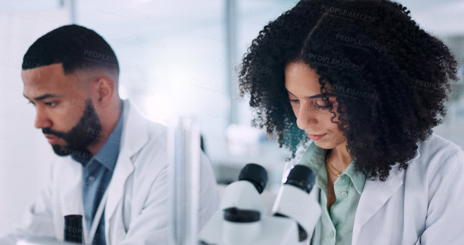 Buy stock photo Collaboration, microscope and science with people in laboratory together for medical research. Development, info and innovation with scientist team in clinical trial for pharmaceuticals or healthcare