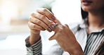 Divorce, woman and hands with wedding ring, nervous and fidget for toxic marriage or cheating drama and betrayal. Relationship fail, person and stress for break up, infidelity or separation in lounge