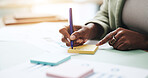 Hands, business person and writing with sticky note, graphs and profit growth or sales analytics. Closeup, woman or financial advisor with pen, paperwork and notes for charts or company revenue