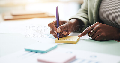 Hands, business person and writing with sticky note, graphs and profit growth or sales analytics. Closeup, woman or financial advisor with pen, paperwork and notes for charts or company revenue