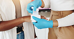 Bandage, clinic and nurse with person for hand injury, hurt or accident  with emergency service. Healthcare, closeup and medical worker with patient for cotton wrap for bruise, wound or muscle sprain
