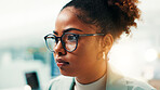 Black woman, programmer and software developer with glasses for new app or development at office. Female person, coder or AI designer with vision for problem solving or troubleshooting at workplace