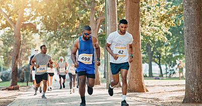Buy stock photo Running, competition and race with people in park for charity event, health challenge and fitness. Speed, fundraising marathon and exercise with group of runners in nature for workout and sports