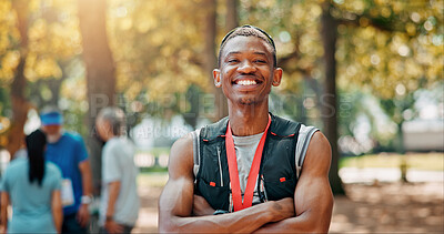 Buy stock photo Sports, athlete and man with arms crossed, marathon and smile for wellness in competition and portrait. Confident, runner and person with fitness for race, happiness and healthy body in morning