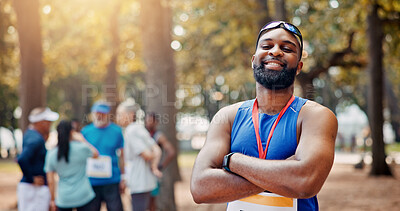 Buy stock photo Portrait, athlete and man with arms crossed, sports and smile for win of competition and confident. Outdoor, runner and person with medal for race, champion and happy for marathon in nature or winner