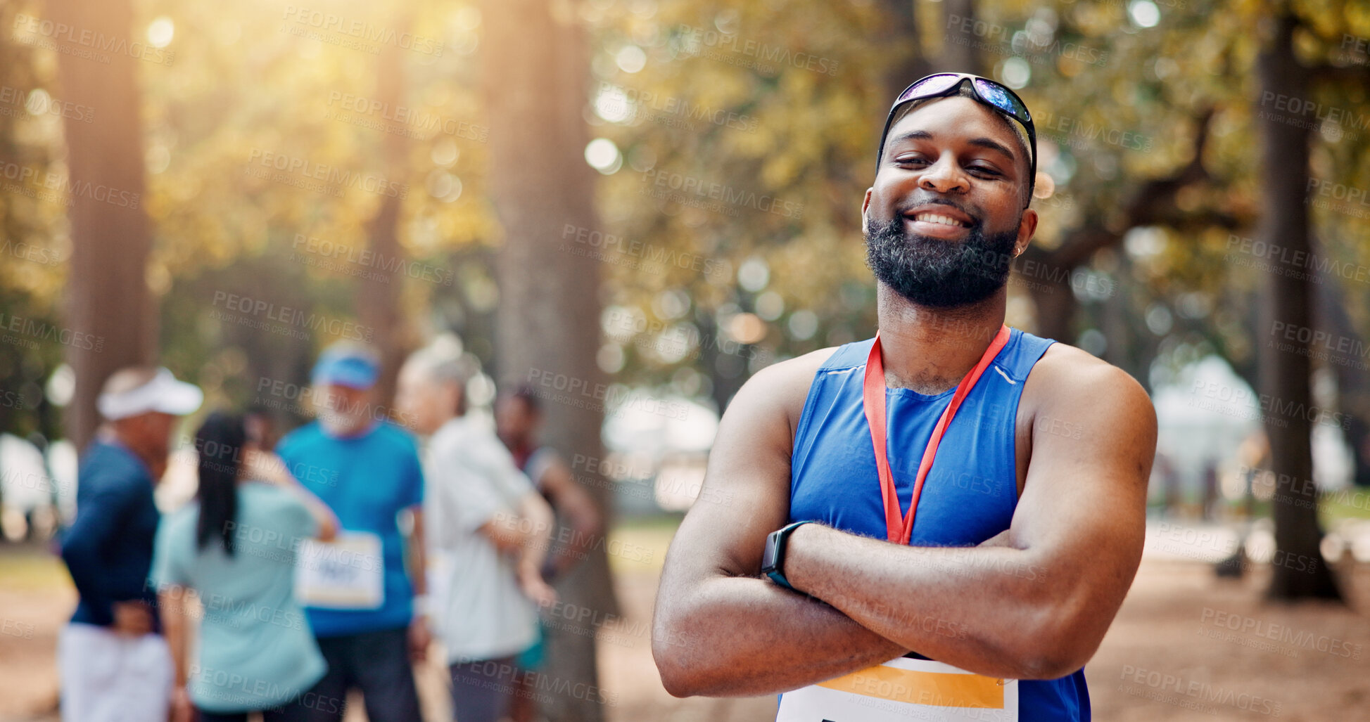 Buy stock photo Portrait, athlete and man with arms crossed, sports and smile for win of competition and confident. Outdoor, runner and person with medal for race, champion and happy for marathon in nature or winner