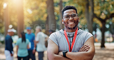 Buy stock photo Portrait, athlete and man with arms crossed, marathon and smile for wellness in competition and sports. Confident, runner and person with fitness for race, happiness and healthy body in morning