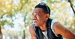 Tired, smile and black man with fitness, training and sweating with break, outdoor and exercise. African person, runner or athlete with workout, exhausted or practice for marathon, relax or challenge