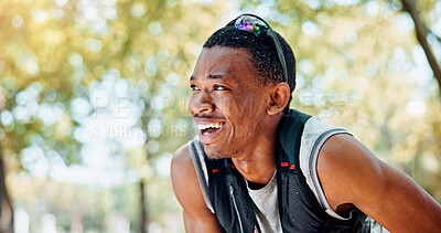 Buy stock photo Tired, smile and black man with fitness, training and sweating with break, outdoor and exercise. African person, runner or athlete with workout, exhausted or practice for marathon, relax or challenge