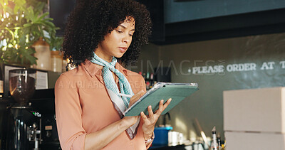 Buy stock photo Coffee shop, online and woman on tablet in cafe for menu items, inventory and order checklist. Restaurant, hospitality and business owner on digital tech for internet, planning and review on website
