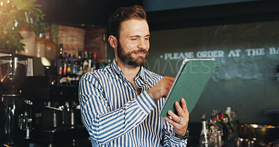 Buy stock photo Coffee shop, manager and man on tablet in cafe for menu items, inventory and order checklist. Restaurant, hospitality and business owner on digital tech for internet, planning and review on website
