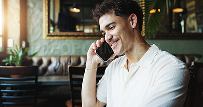 Buy stock photo Happy man, conversation and talking with phone call at cafe for friendly discussion or chat. Male person, freelancer or customer with smile on mobile smartphone for contact or review at restaurant