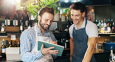 Buy stock photo Men, bartender and happy with tablet, talking and sales report at pub, results and revenue at diner. People, mentor and digital touchscreen with app for inventory, menu and excited at restaurant