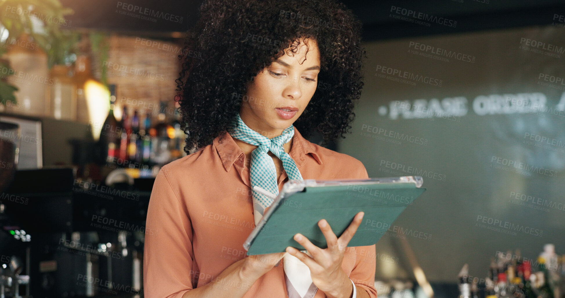 Buy stock photo Coffee shop, typing and woman on tablet in cafe for menu items, inventory and order checklist. Restaurant, hospitality and business owner on digital tech for internet, planning and review on website