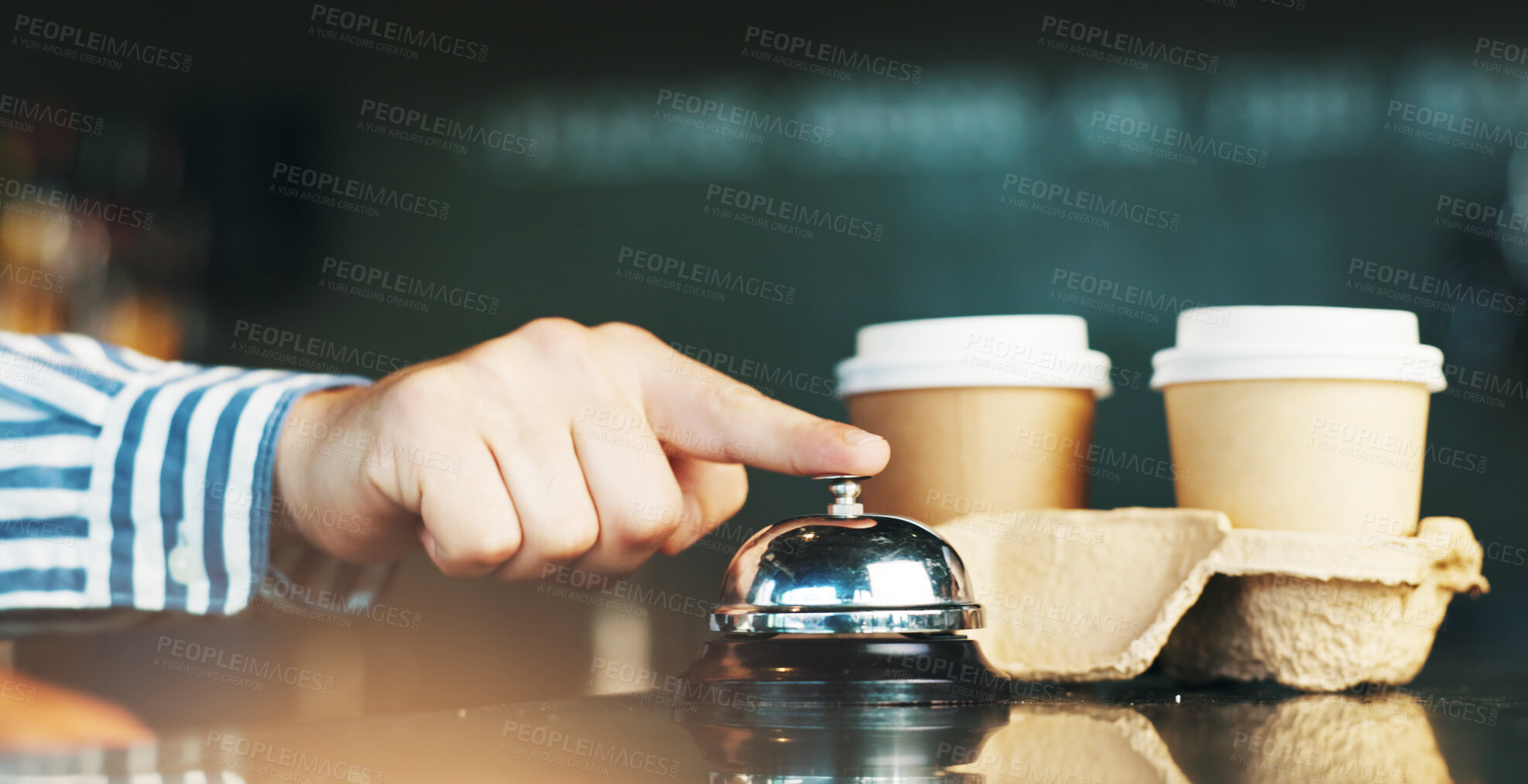Buy stock photo Person, hands and bell with coffee for service, customer attention or signal on cafe counter. Closeup, consumer or touch with ring for hospitality, staff or help at shop, restaurant or cafeteria