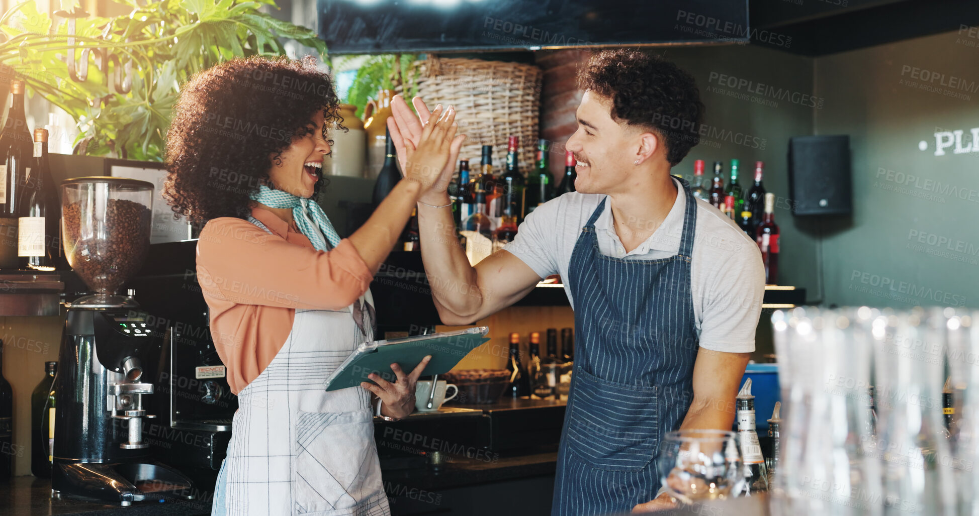 Buy stock photo Happy, business people and cafe with high five or tablet for retail success, winning or teamwork. Man, woman or employees with smile or motivation for catering or bartending service at restaurant