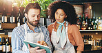 Small business, online and team with tablet, cafe and review of order for inventory and collaboration. Discussion, woman and man with tech for sales, people and colleagues with ideas in meeting