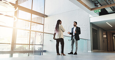 Buy stock photo Meeting, business and people talk in lobby with discussion, planning and feedback for convention. Woman, man and explaining schedule with communication, event agenda and advice for keynote speaker