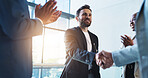 Office, handshake and man with business people with applause for success, congratulations and celebration. Corporate, deal and men and women shaking hands for job promotion, achievement or onboarding