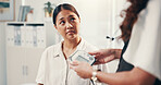 Doctor, worry and blood pressure with women in hospital for healthcare advice, heart rate and cardiovascular results. Medical assessment, hypertension diagnosis and anxiety with people in clinic