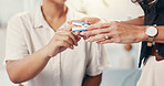 Doctor, patient and hand with pulse oximeter for oxygen measurement, respiratory assessment and wellness check. Healthcare, people and checking heart rate on finger for medical reading at hospital