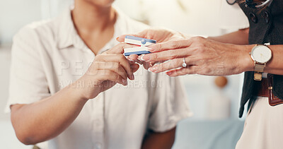 Buy stock photo Doctor, patient and hand with pulse oximeter for oxygen measurement, respiratory assessment and wellness check. Healthcare, people and checking heart rate on finger for medical reading at hospital