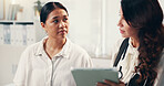 Doctor, women and consultation with tablet, conversation and explain treatment for illness. People, medical or professional with client, tech or app with healthcare, diagnosis or advice for insurance
