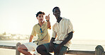 Pointing, men and friends with view by beach on tropical vacation, break or weekend trip. Relax, bonding and male people by ocean for seaside holiday, getaway or travel location together on adventure