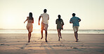 Running, sunset and back of people on beach for tropical vacation, break or holiday together. Freedom, energy and group of friends by ocean for seaside weekend trip for travel with activity in summer