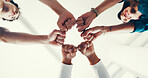 Fist bump, circle and team of doctors in hospital from below for collaboration, achievement or support. Medical partnership, hands together and group of healthcare workers with community in clinic.