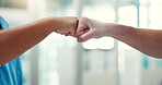 Hands, fist bump and gesture for team support, mission or collaboration with solidarity. People, trust and synergy for motivation, partnership and cooperation for unity with gesture for agreement