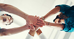 Stack of hands, collaboration and doctor with nurses in hospital for celebration, achievement or support. Medical team, synergy and group of healthcare workers with community in clinic from below.