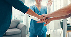 Stack of hands, celebration and doctor with nurses in hospital for collaboration, achievement or support. Medical partnership, synergy and group of healthcare workers with community in clinic.
