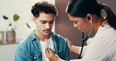Buy stock photo Doctor, patient and consultation for healthcare with stethoscope, chest exam or cardiology checkup. Medicine, health and people in hospital office for medical evaluation, listening to heart and help