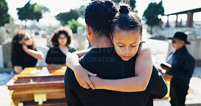 Buy stock photo Girl, hug or father in graveyard for funeral, compassion or burial for death, support or crying with coffin. Child, embrace or sad kid in cemetery for grief, loss or mourning with dad and empathy