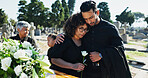 Hug, grief and funeral with people, graveyard or empathy with emotion, mental health or comfort. Ceremony, outdoor or family with loss, support or sad with compassion, mourning or embrace with burial