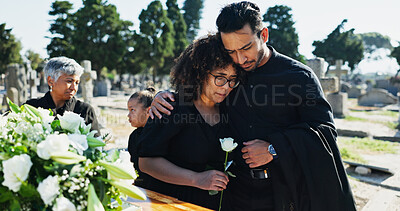 Buy stock photo Hug, grief and funeral with people, graveyard or empathy with emotion, mental health or comfort. Ceremony, outdoor or family with loss, support or sad with compassion, mourning or embrace with burial