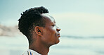 Black man, space and breathing to relax with fresh air at beach for peace, tranquility or natural oxygen. Calm, profile or person on holiday at ocean coast for vacation mockup or outdoor meditation