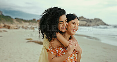 Buy stock photo Love, hug and date with lesbian couple at beach for romance, vacation and support. Happiness, bonding and lgbt relationship with women and embrace in nature for summer break, holiday and honeymoon