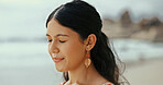 Woman, meditate or breathing to relax with fresh air at beach for break, tranquility or natural oxygen. Calm, peace or person on holiday at sea or ocean coast for vacation travel and outdoor freedom