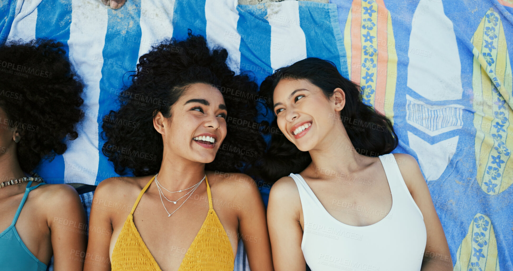 Buy stock photo Friends, happy women and relax on blanket at beach for vacation, holiday and travel with top view. Girls, smile and outdoor together at coast above for funny conversation, laugh or bonding in summer