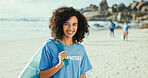 Girl, portrait and bag for cleaning at beach with smile, outdoor and pride on earth day for plastic. Woman, volunteer and happy by sea for accountability with recycling, dirt and waste management