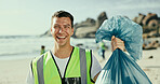 Man, smile and plastic bag for cleaning beach in portrait, outdoor or excited on earth day with care for environment. Person, volunteer and happy by sea for accountability with trash, garbage or dirt