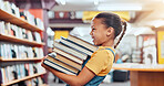 Happy, carry and child with books in library excited for reading story, literature and learning. School, bookstore and girl with stack of novels for knowledge, education and language development